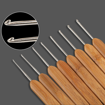 Bambusgriff-Häkelnadel stellte Stricknadel-Edelstahl-Kopf-nähende Zusätze ein